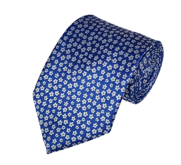 Flor gris sobre corbata azul