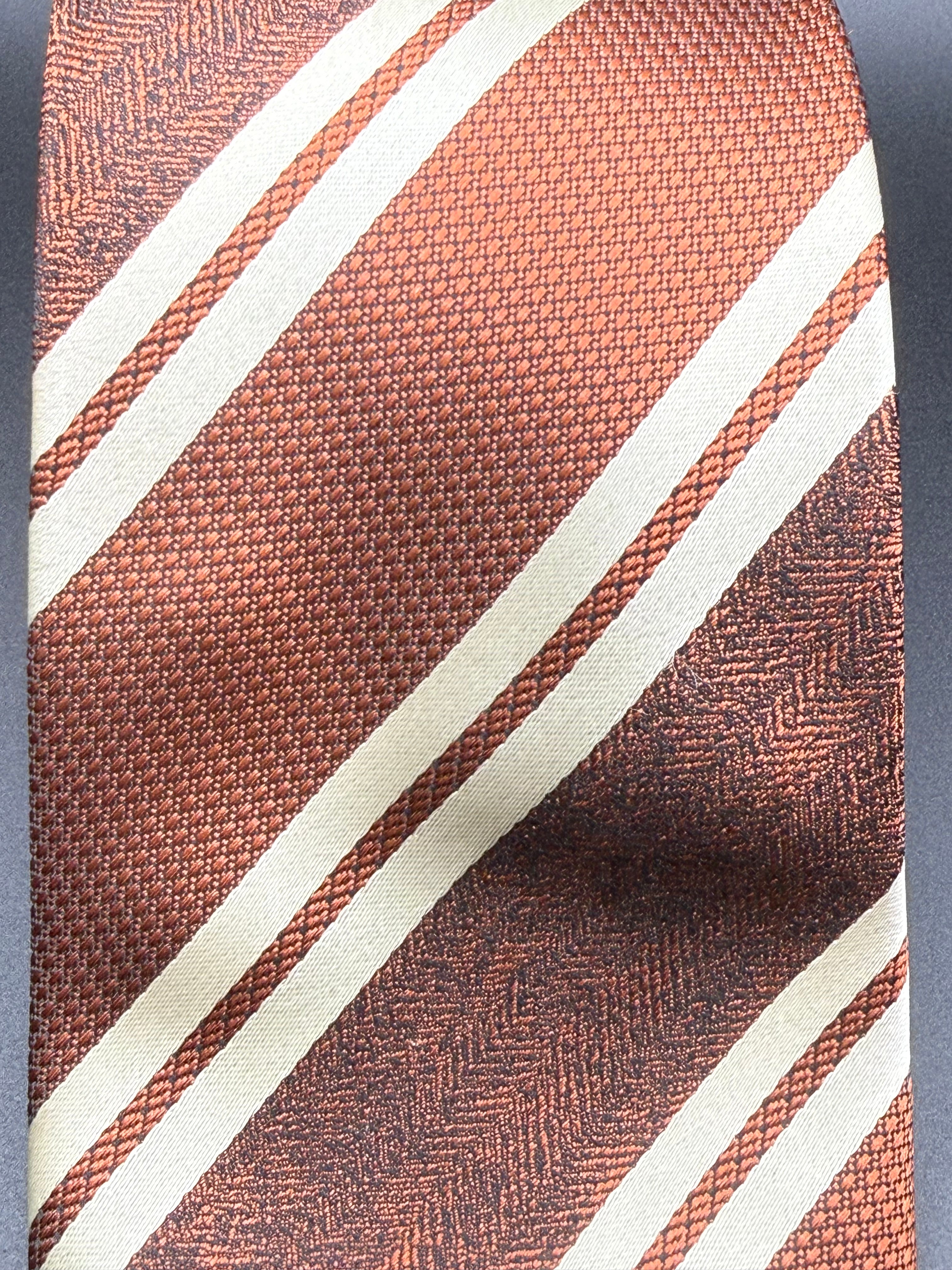 White and Brown Stripes on Brown Necktie