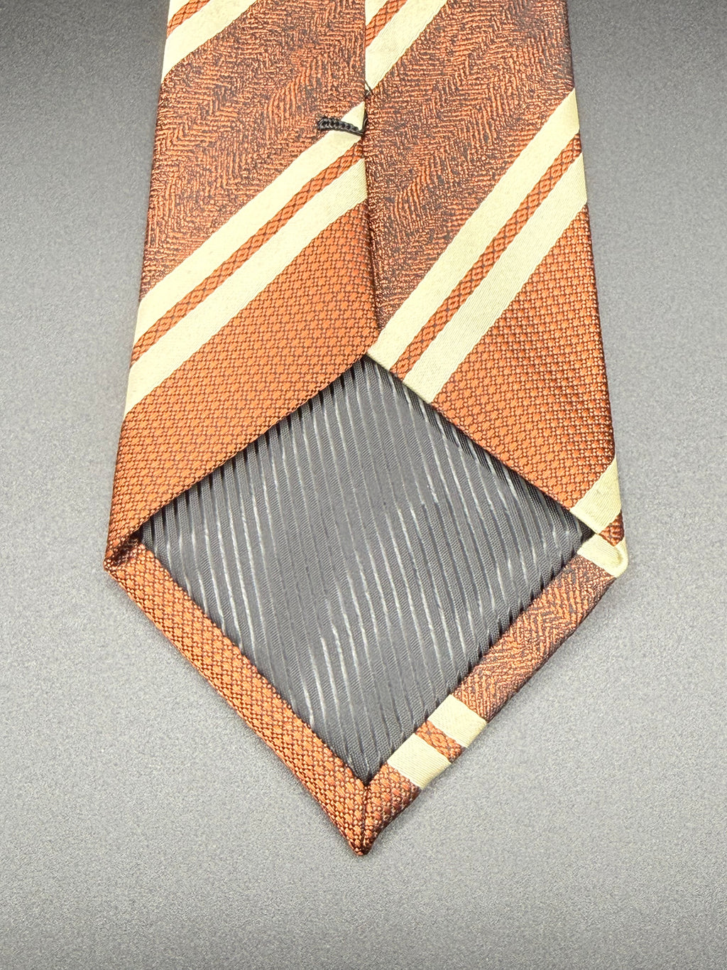 White and Brown Stripes on Brown Necktie
