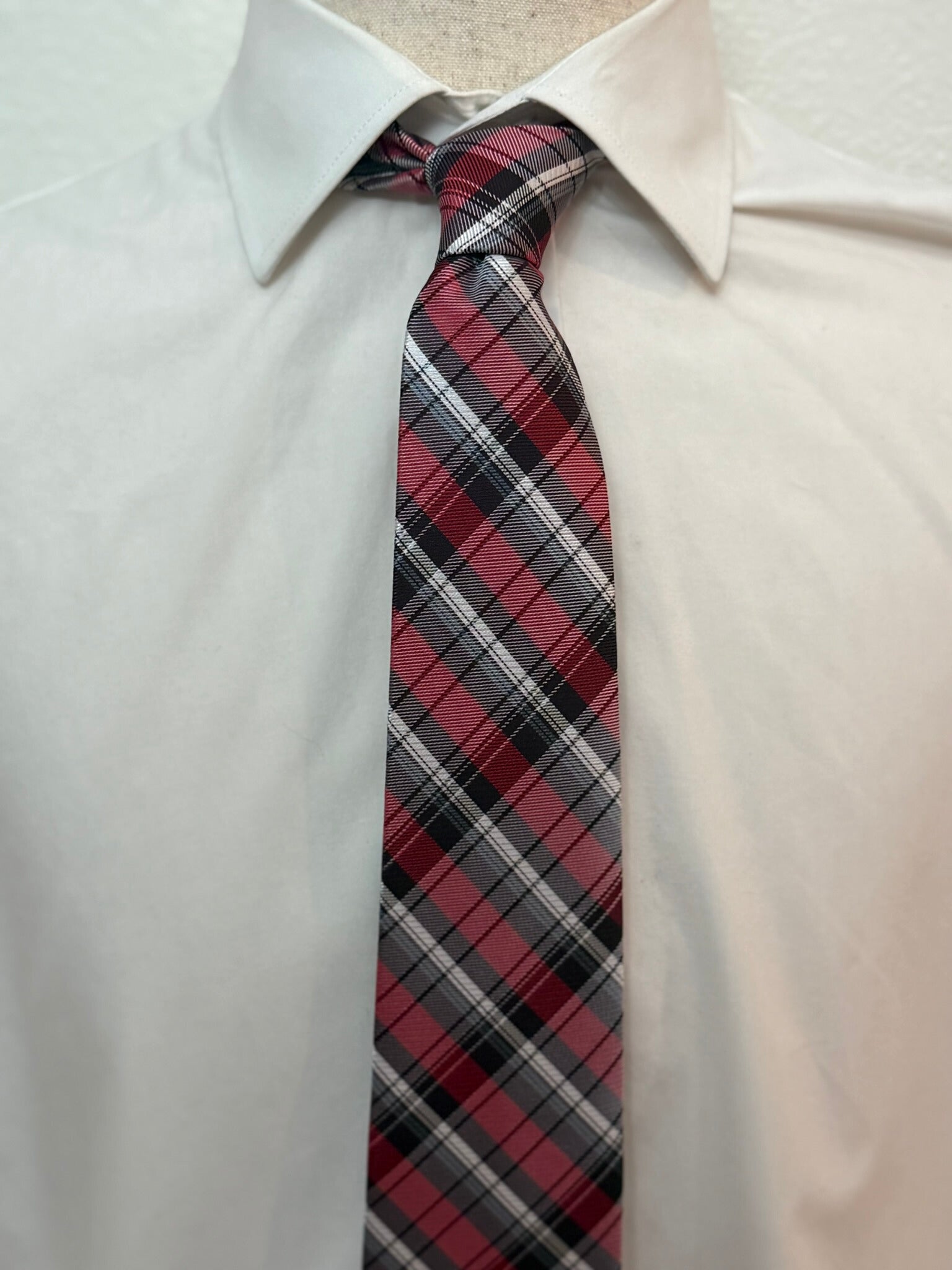 White, Gray, and Black Stripes on Red Plaid Necktie
