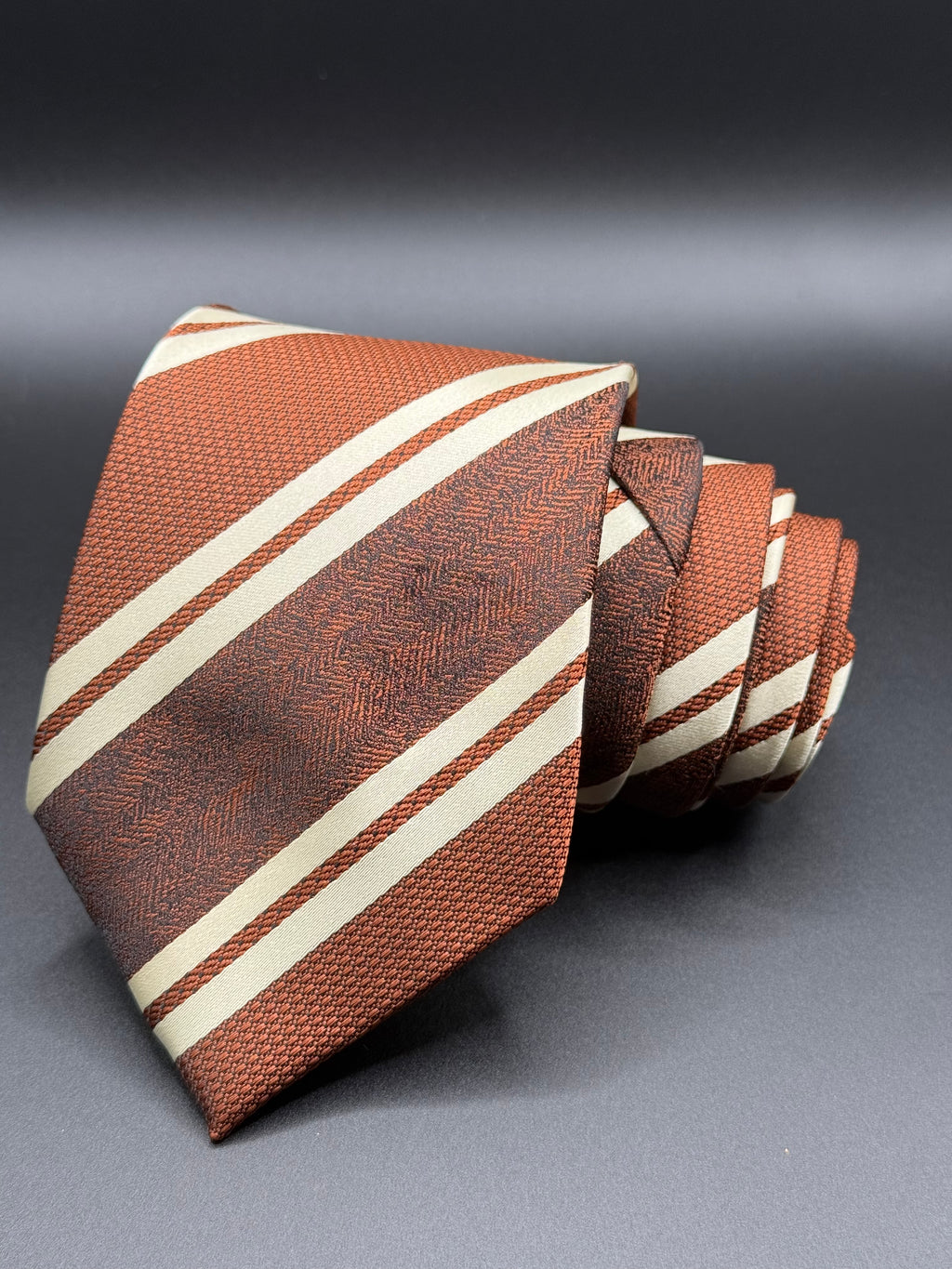 White and Brown Stripes on Brown Necktie