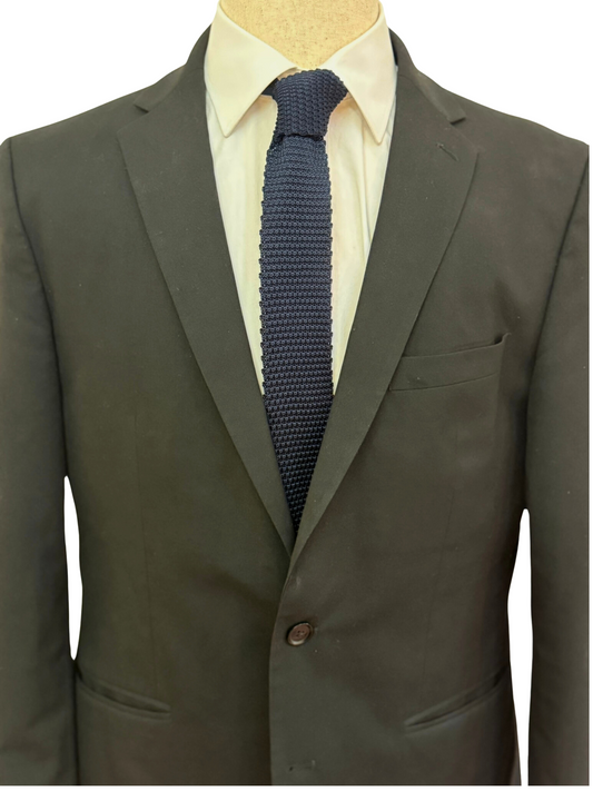 Corbata de punto azul marino lisa